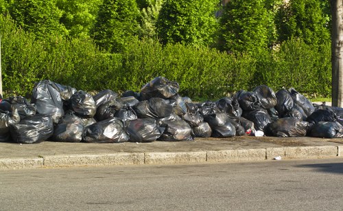 Professional grab operator handling waste
