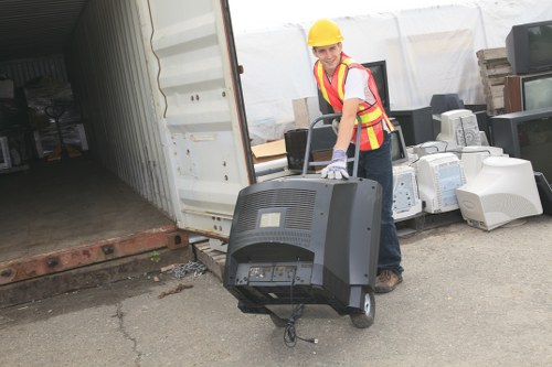 Business professionals discussing skip hire options