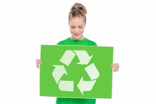 Waste being loaded into a skip for hire